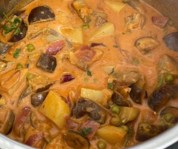 An instant pot is with Eggplant potato curry.