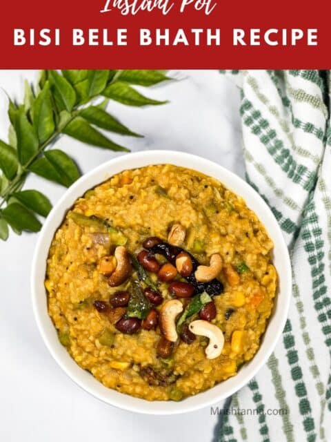 A bowl of bisi bele bath is on the marble table.