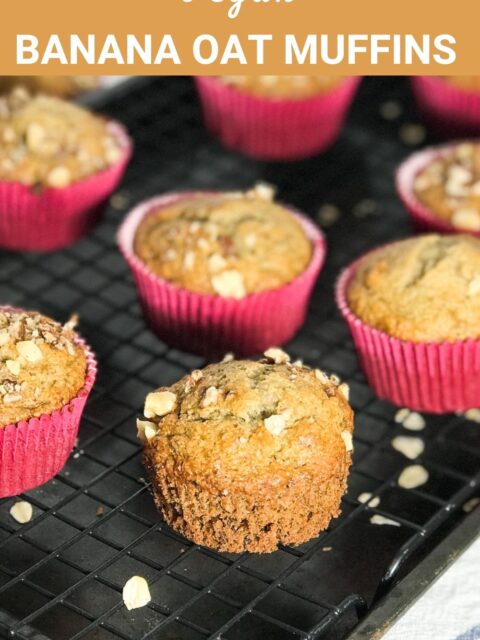 Close up of banana oat muffins and topped with rolled oats
