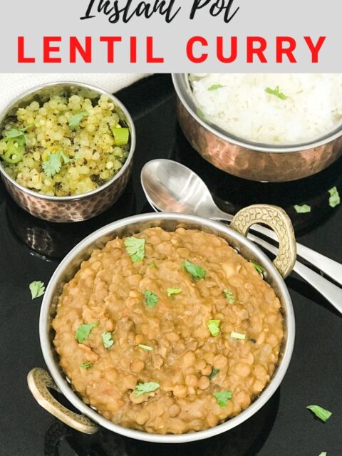 A bowl of lentil curry is placed on the black serving tray