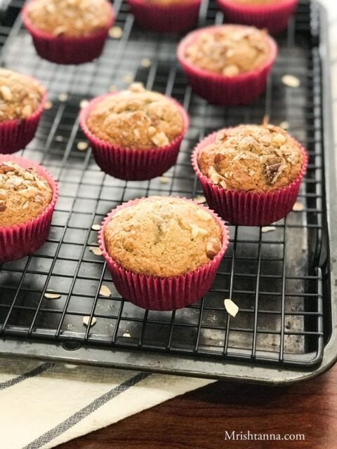 Banana oat muffins are placed on the cooling wire rack