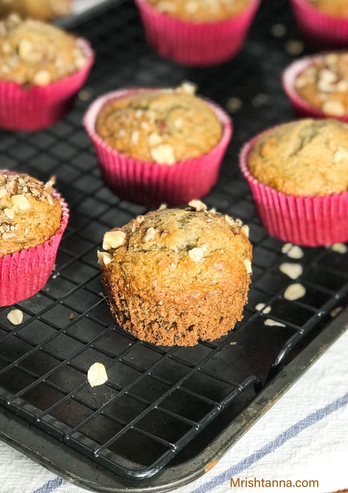 A close up of muffin and topped with rolled oats