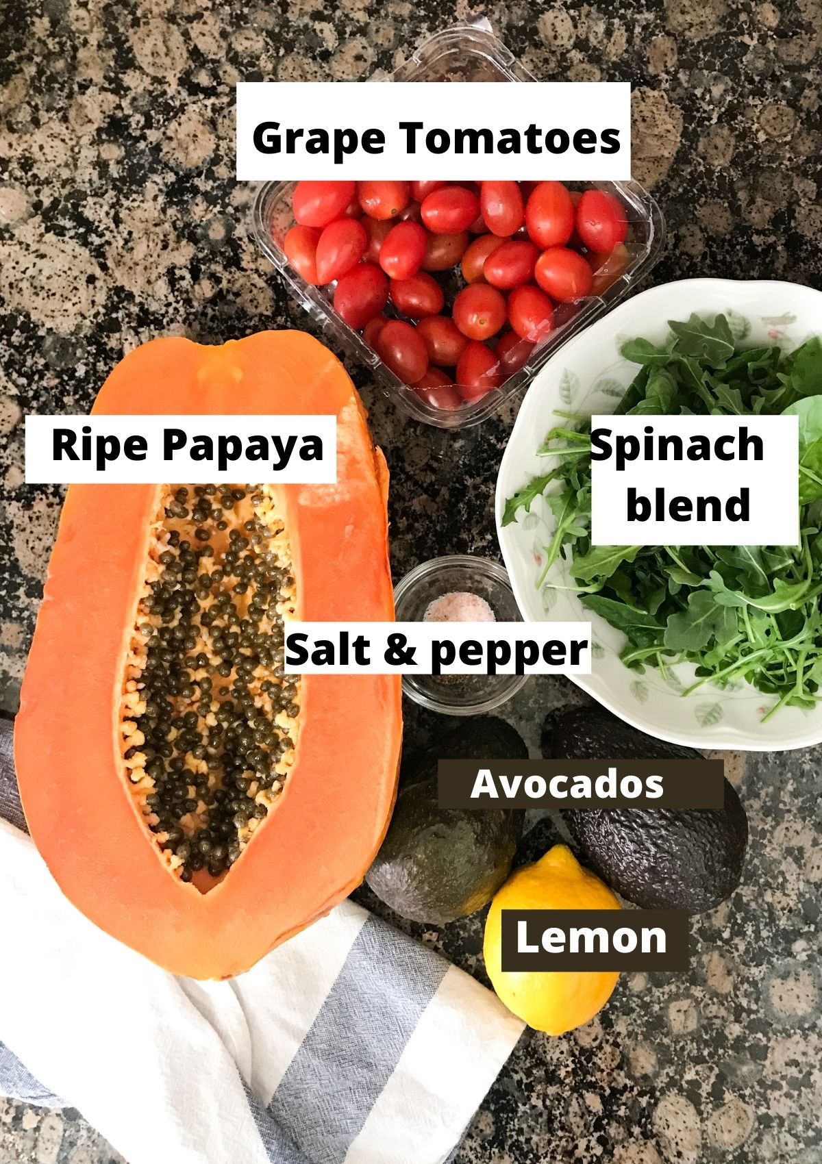 Papaya salad ingredients like avocado, spinach, tomatoes