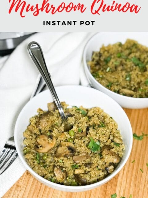 A bowl of quinoa mushroom is on the table with spoon inserted