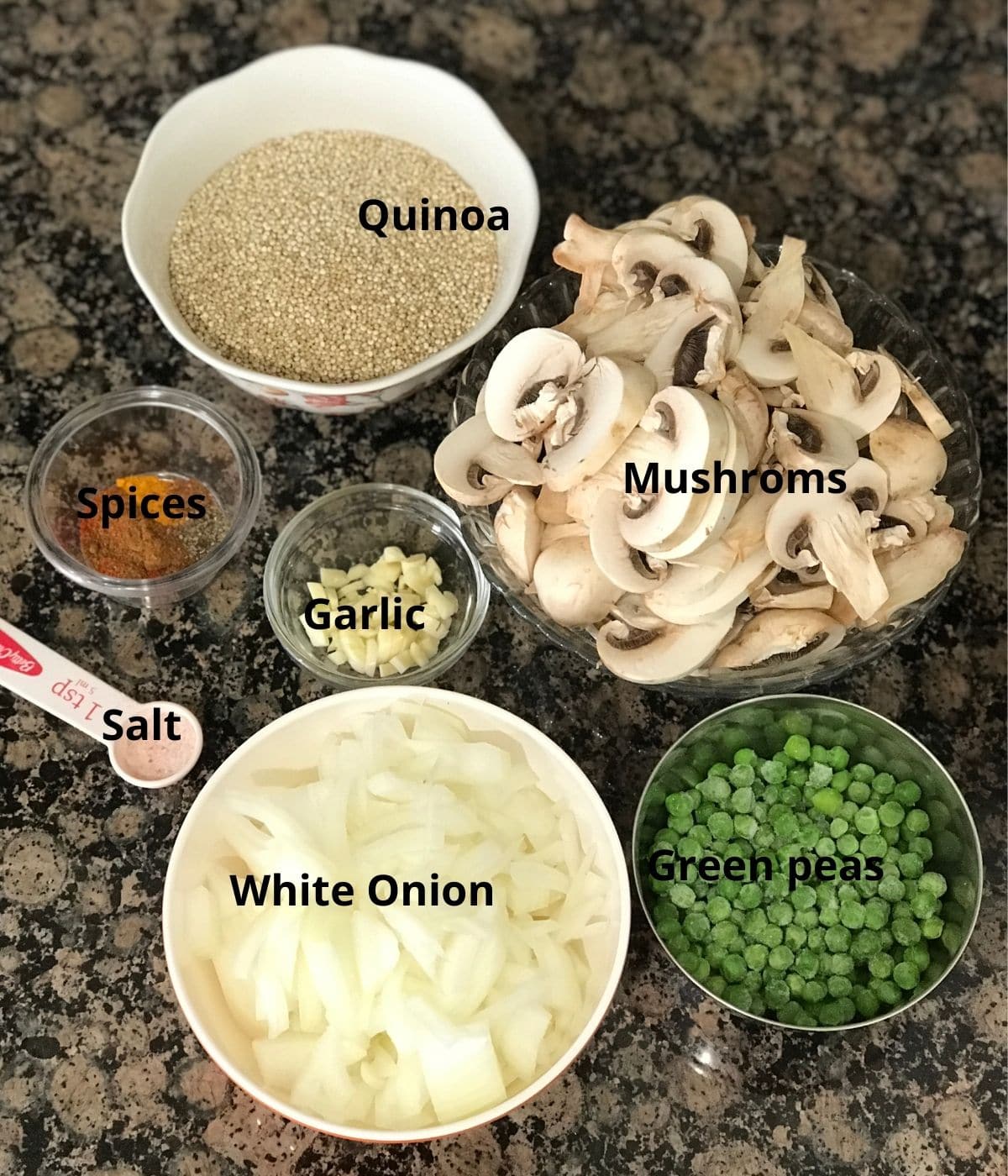 All the ingredients like onions, mushrooms, spices are placed on the counter tops