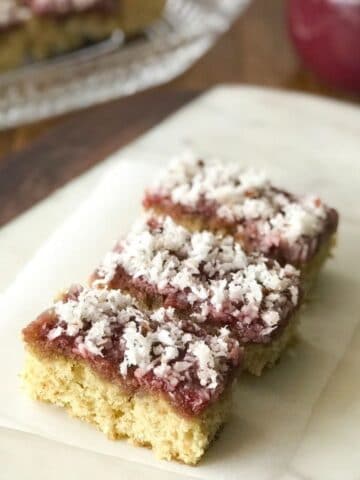 honey cake is placed on the white serving tray