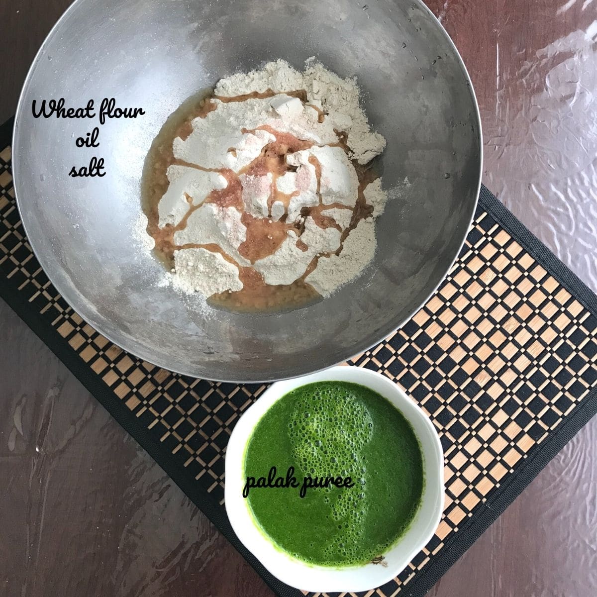 A bowl is filled with wheat flour, and spinach puree for puri recipe