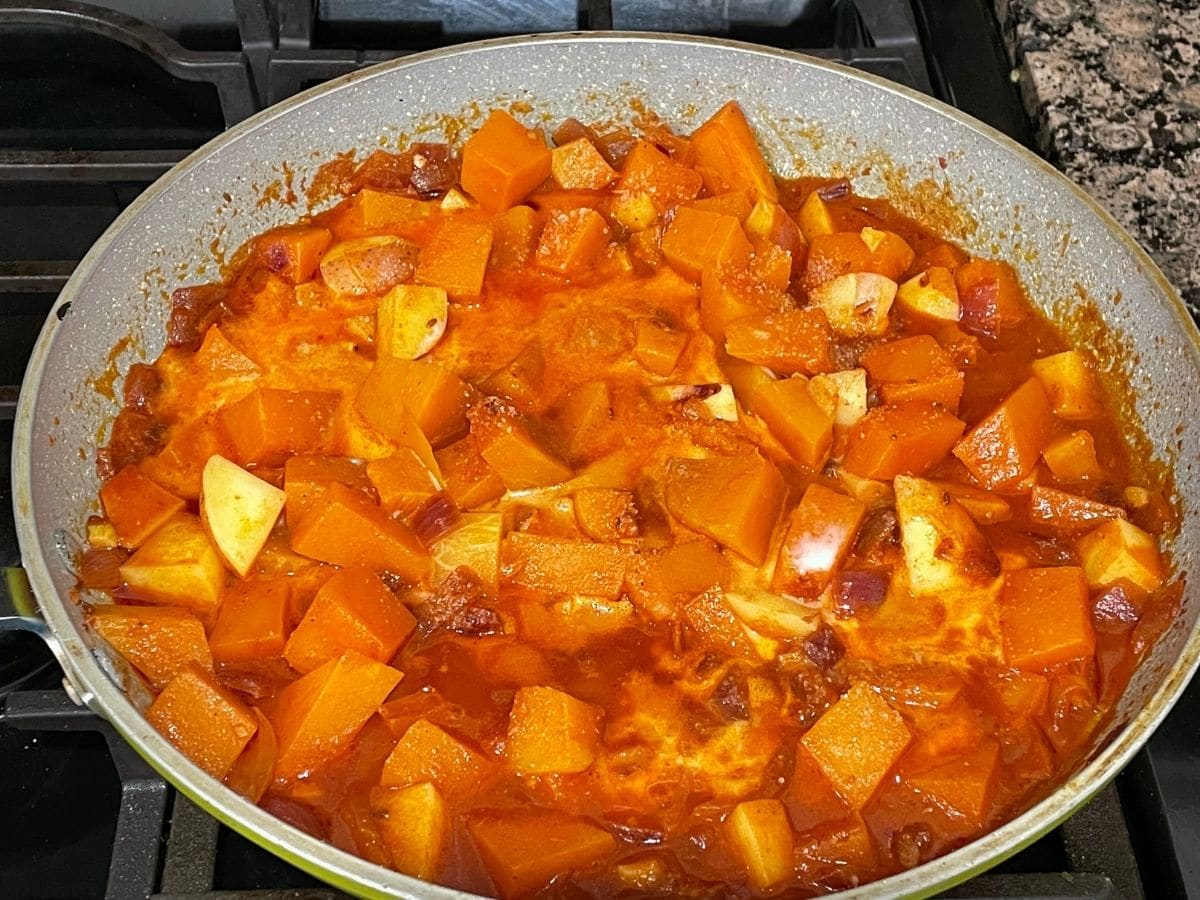 Pumkin curry is with coconut milk and cooking over the medium heat