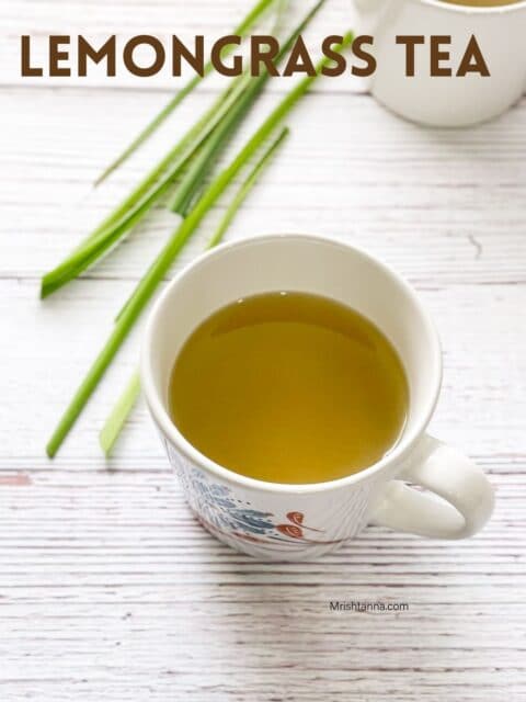 A cup of lemongrass tea is on the surface.