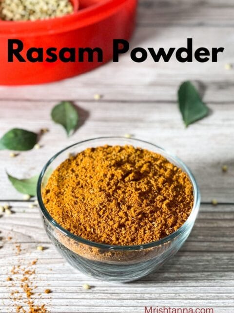 A bowl if rasam podi is on the table.