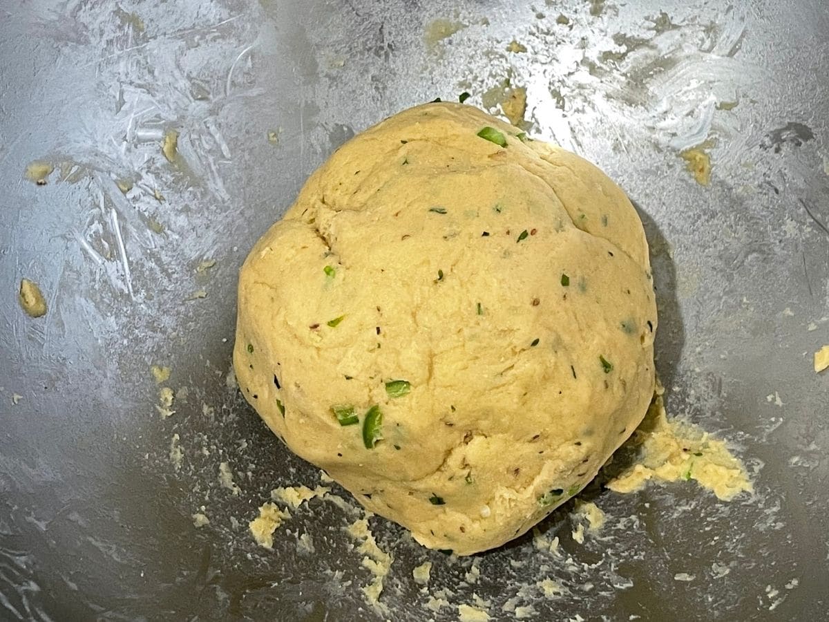 besan roti dough is inside the bowl