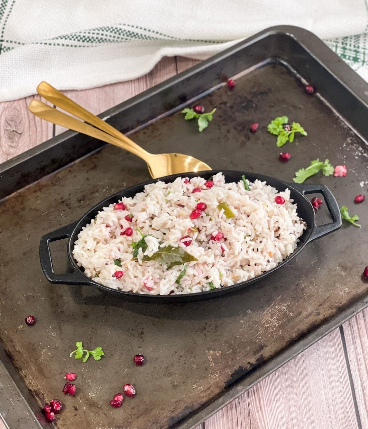 A bowl of coconut rice is on the table.