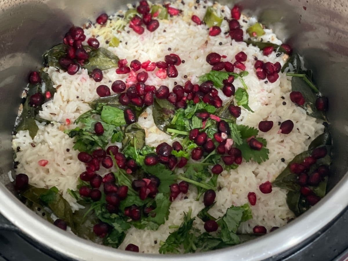 A pot is with indian style coconut rice.