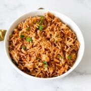 Bowl of instant pot tomato rice is on the table.