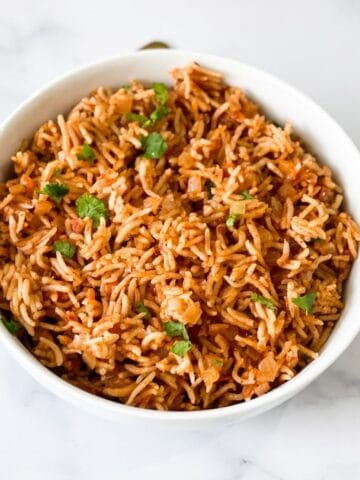 Bowl of instant pot tomato rice is on the table.