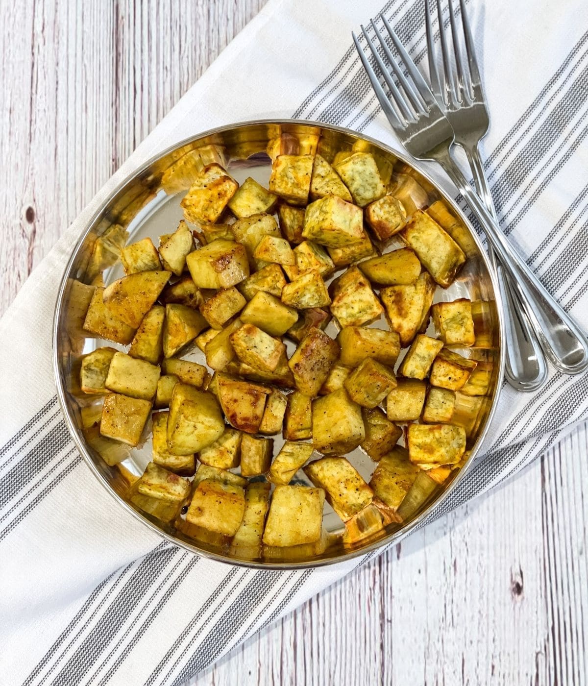 Head shot of air fried sweet potato chunks.