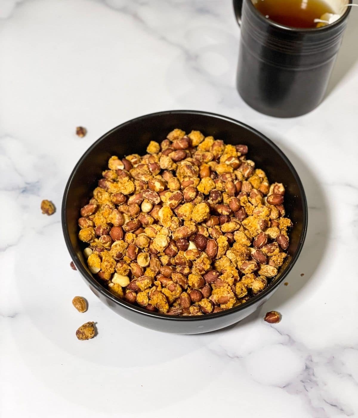 Bowl of air fried masala peanuts.