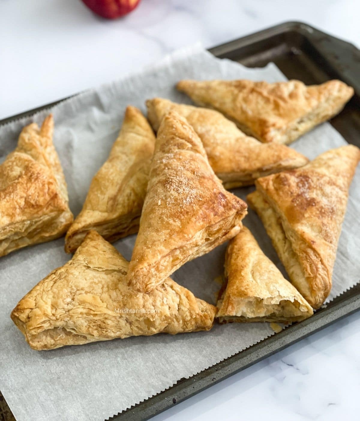 A tray is with air fryer apple turnovers.