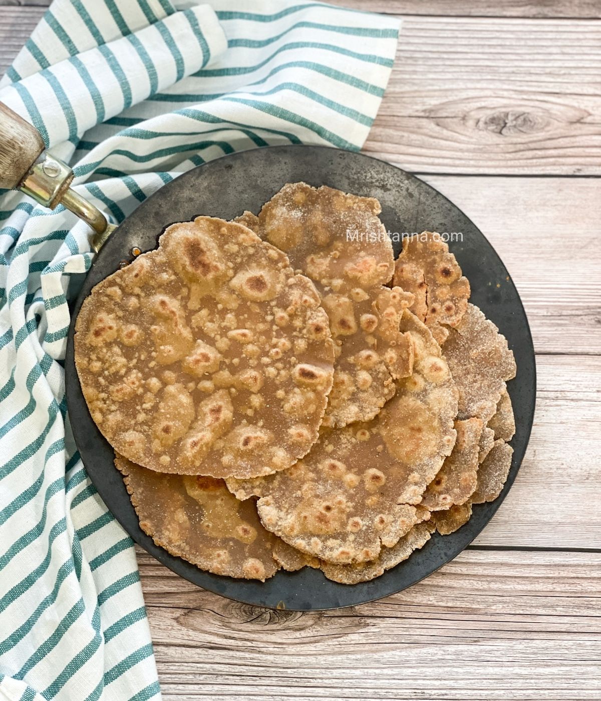 A tawa is with gluten free rotis.