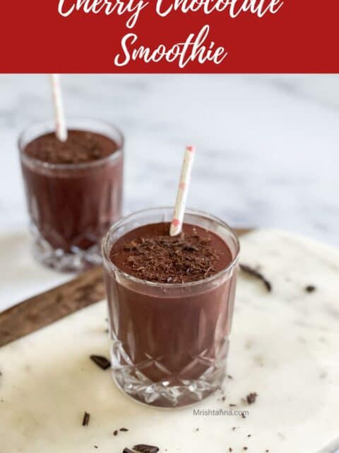 two glasses of Cherry chocolate smoothie are on the table.