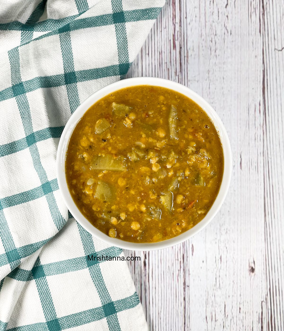 head shot of bowl of lauki chana dal.