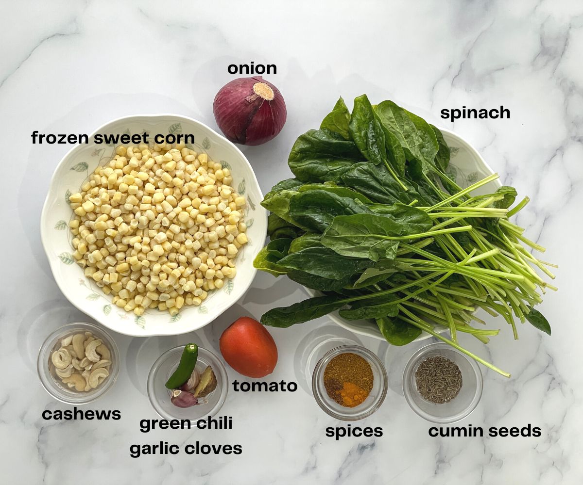 Corn palak ingredients are placed on the surface.