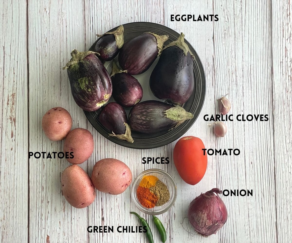 aloo baingan ingredients are on the table.