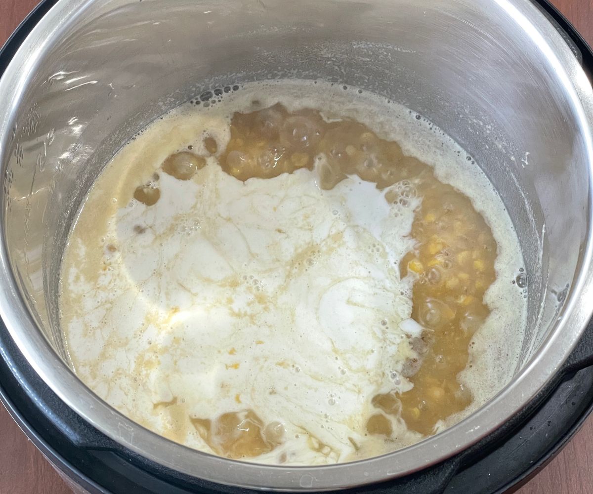 An instant pot is with chana dal payasam on saute mode.