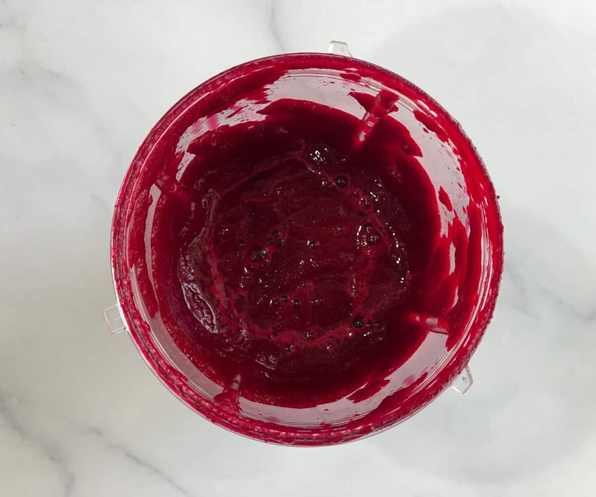 A blender is with beets puree.