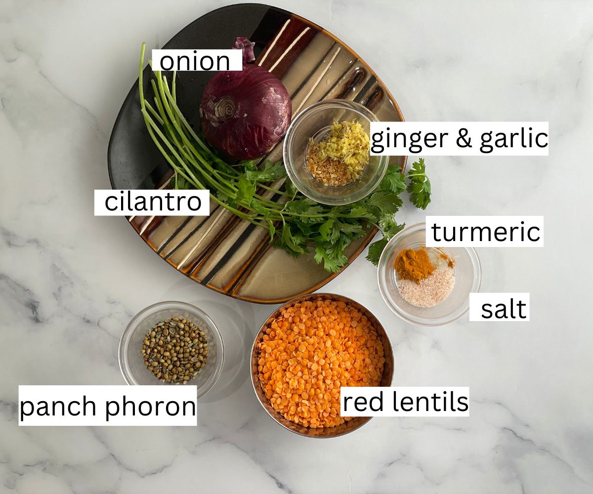 Bengali masoor dal ingredients are on the table.