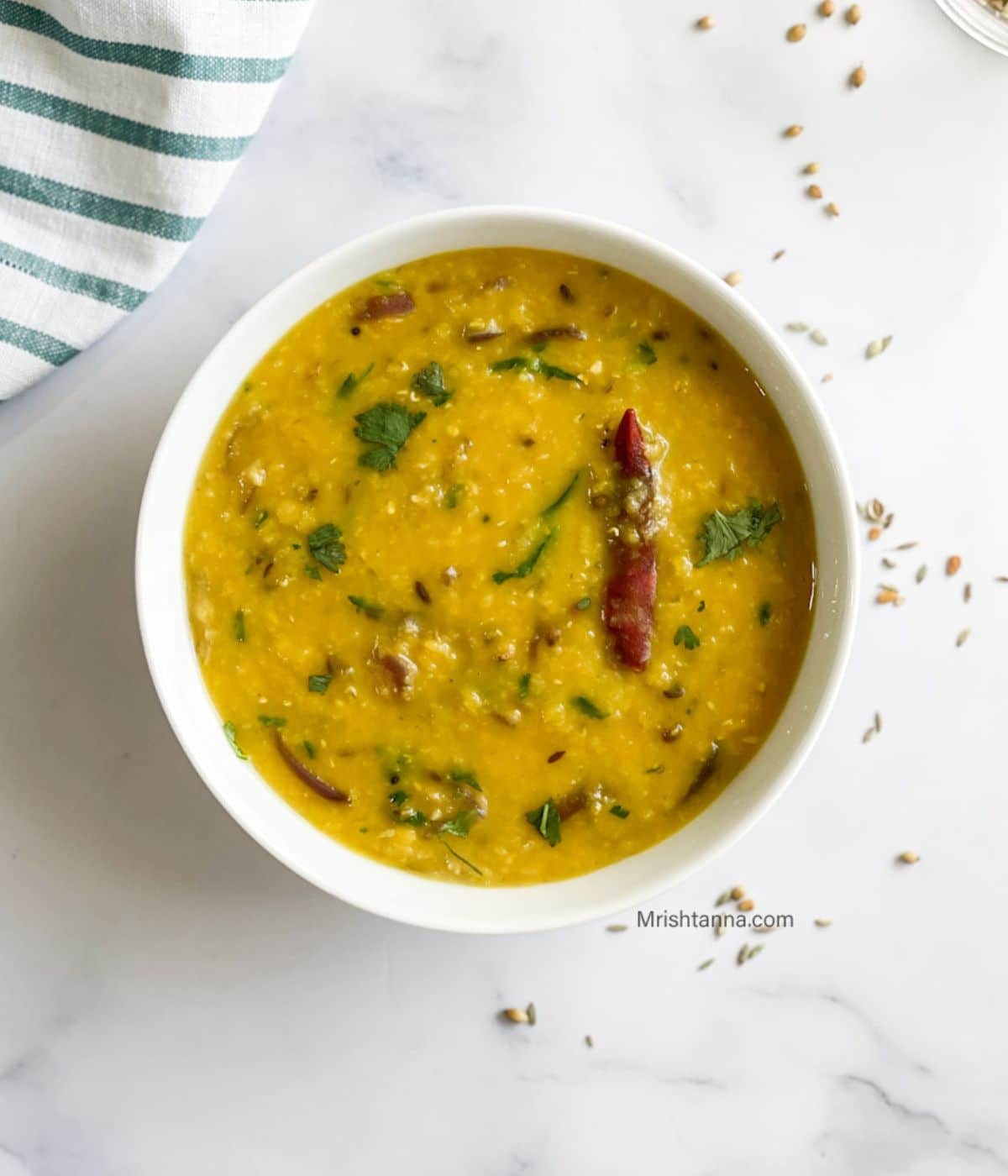 Head shot of bowl with Bengali masoor dal.