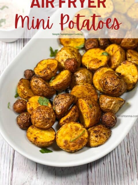 Air fryer Roasted mini potatoes are on the white tray.