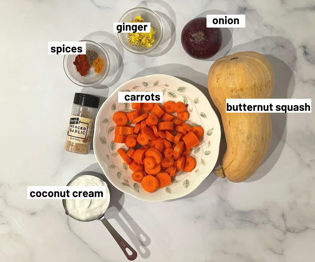 Butternut squash soup ingredients are on the table.