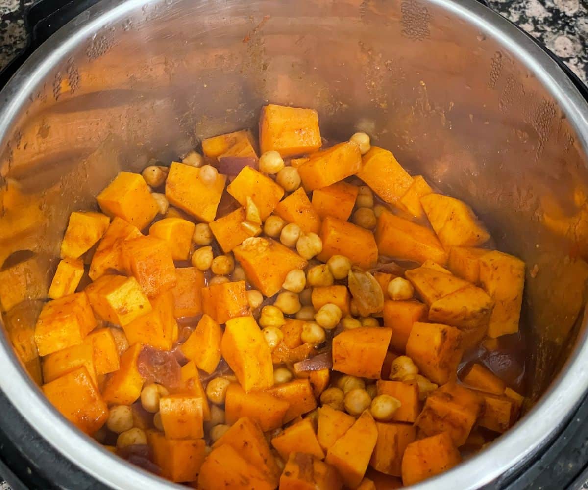 An instant pot sweet potato curry is cooked under pressure.