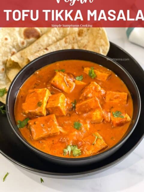 A bowl is with vegan tikka masala curry.