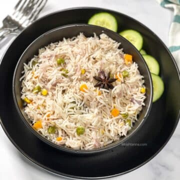 A bowl is with instant pot vegetable pulao.