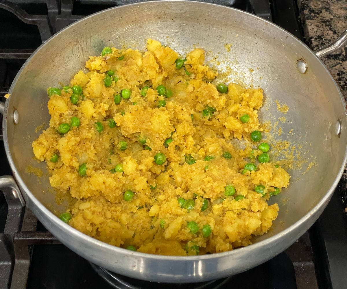 A pot is with samosa stuffing.