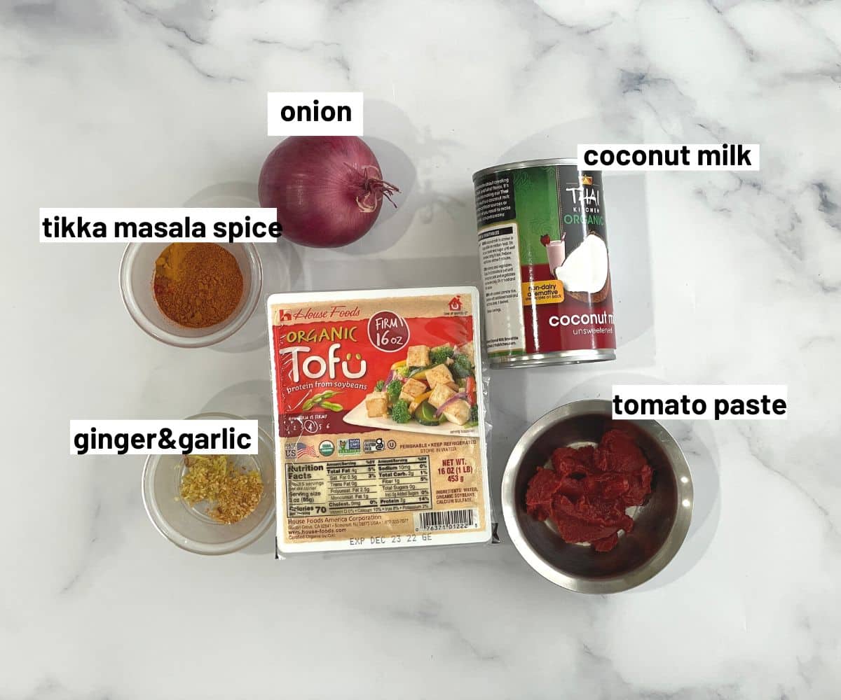 Tofu tikka masala ingredients are on the table.