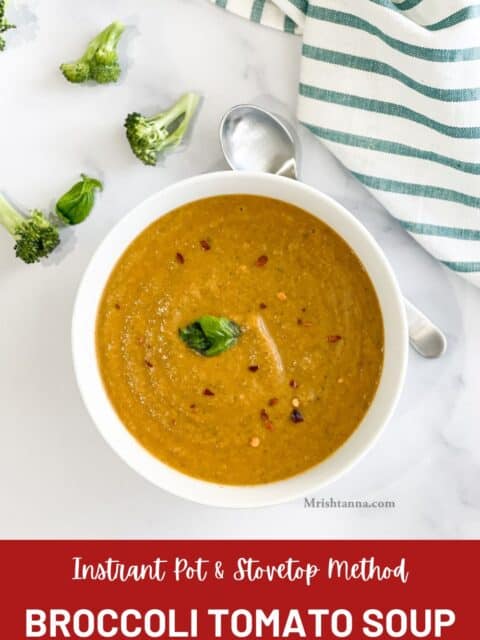 A bowl of broccoli soup is on the table.