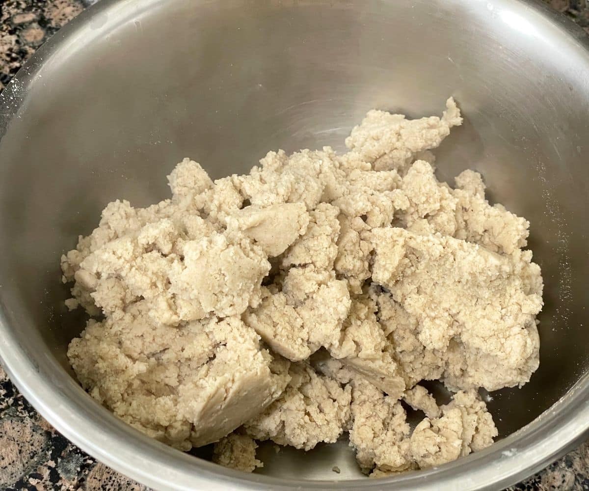 A bowl is with sorghum roti dough.