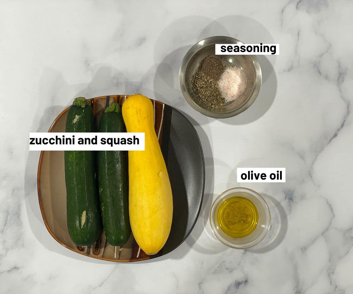 Air fryer zucchini ingredients are on the table.