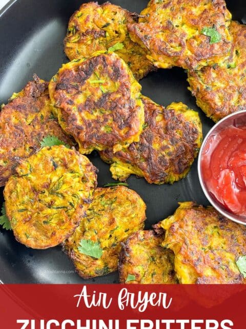 Vegan zucchini fritters are on the plate.