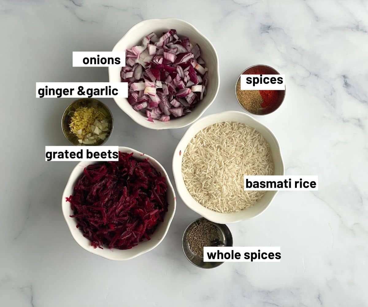 Beetroot pulao ingredients are on the table.