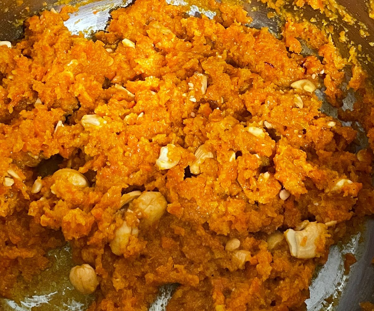 An instant pot is with gajar halwa.