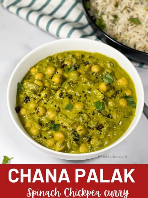 A bowl of chana saag curry is on the table.
