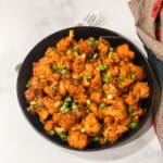 A plate is with air fried lasuni gobi.