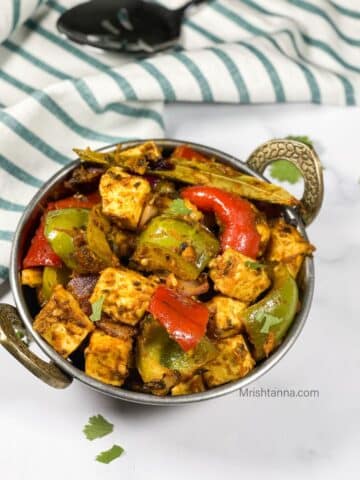 A pot is with Indian tofu kadai stir fry.