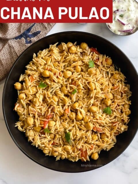 A plate of chana pulao is on the surface.