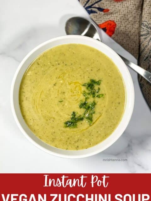 A bowl of Instant pot zucchini soup is on the surface.