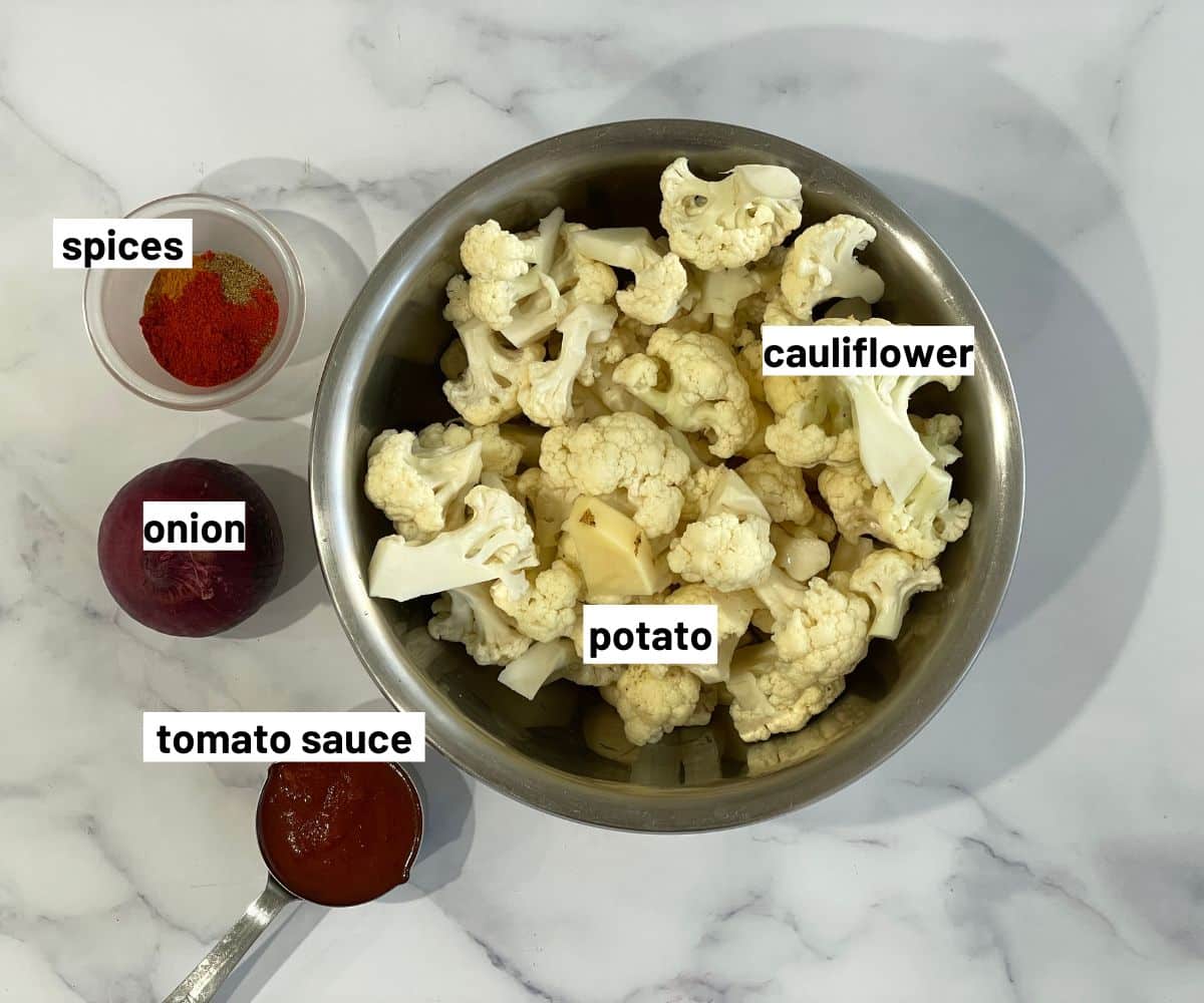 Aloo gobi ingredients are on the table.